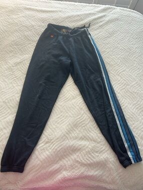 Women’s Black Aviator Nation sweats with Blue Stripe